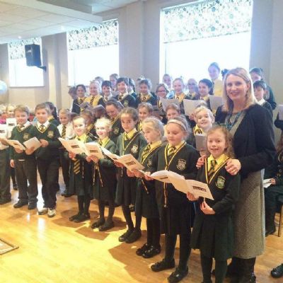 Our school choir visit St. Gregory's Parish Club for Christmas entertainment